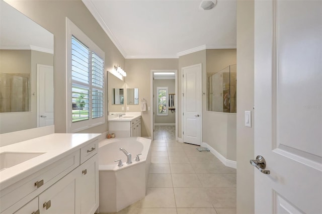 13918 Old Creek Ct, Parrish, FL 34219 - full bathroom with a shower stall, tile patterned flooring, a bath, two vanities, and baseboards