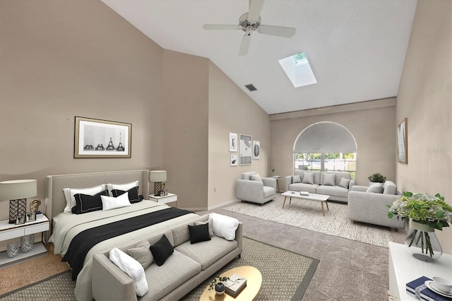 4517 Las Brisas Ln, Sarasota, FL 34238 - bedroom featuring carpet floors, high vaulted ceiling, a skylight, a ceiling fan, and baseboards