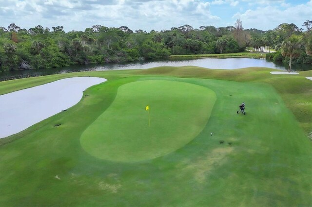 4517 Las Brisas Ln, Sarasota, FL 34238 - surrounding community featuring a water view, view of golf course, and view of scattered trees