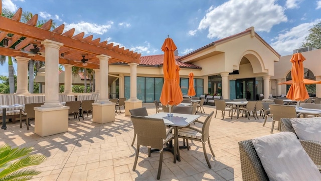 4517 Las Brisas Ln, Sarasota, FL 34238 - view of patio / terrace featuring outdoor dining area, a pergola, a ceiling fan, and outdoor lounge area