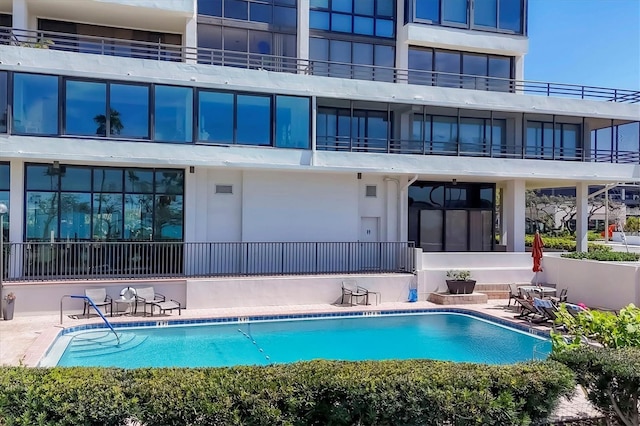 community pool featuring a patio