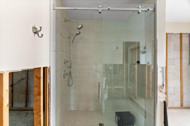 bathroom with a shower stall