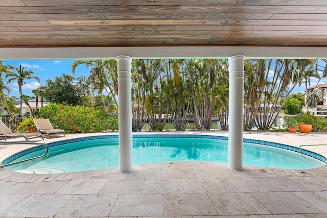 outdoor pool featuring a patio area