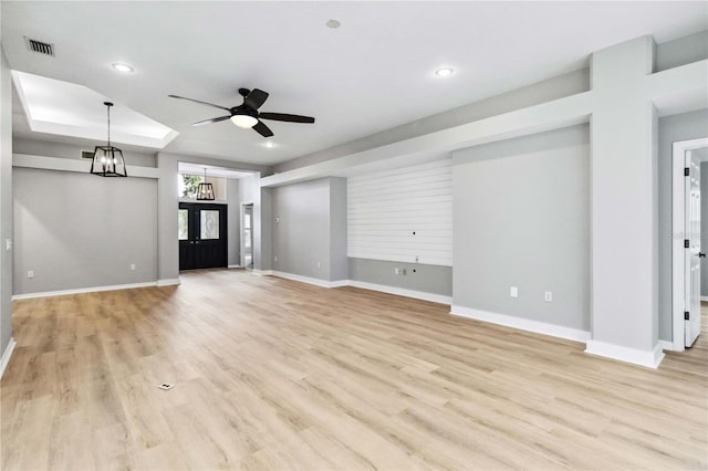unfurnished living room with light wood-style floors, ceiling fan, baseboards, and recessed lighting