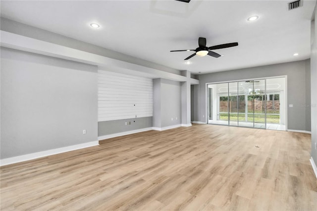 empty room with recessed lighting, baseboards, light wood-type flooring, and a ceiling fan