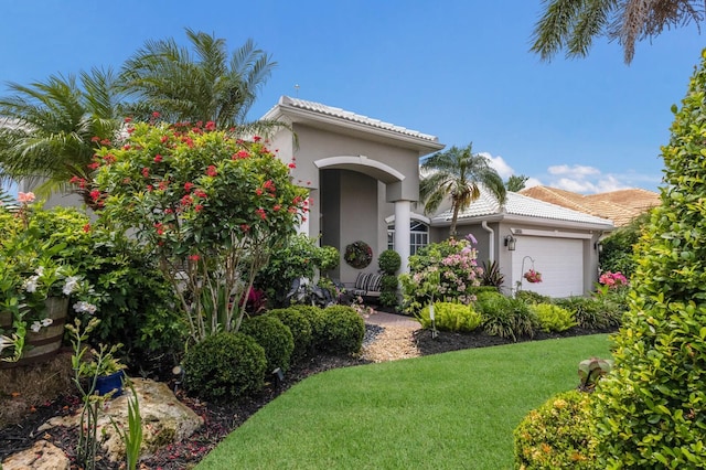 3806 72nd Ter E, Sarasota, FL 34243 - mediterranean / spanish-style home with an attached garage and stucco siding