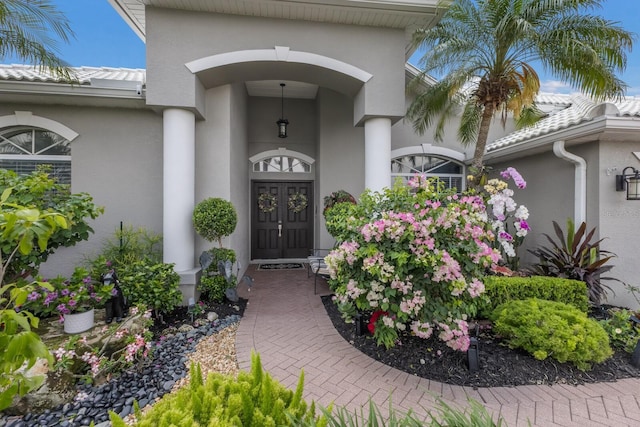3806 72nd Ter E, Sarasota, FL 34243 - view of exterior entry featuring stucco siding