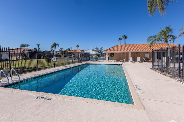 3806 72nd Ter E, Sarasota, FL 34243 - community pool with fence and a patio
