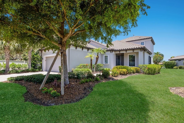8191 Gabanna Dr, Sarasota, FL 34231 - view of front of property with a garage, a tile roof, stucco siding, and concrete driveway