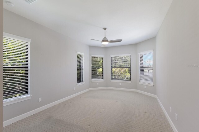8191 Gabanna Dr, Sarasota, FL 34231 - spare room featuring ceiling fan, light colored carpet, and baseboards