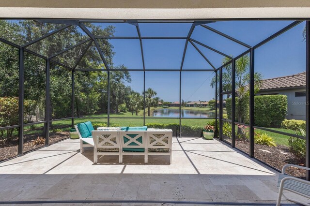 8191 Gabanna Dr, Sarasota, FL 34231 - view of patio featuring a water view, outdoor lounge area, and a lanai