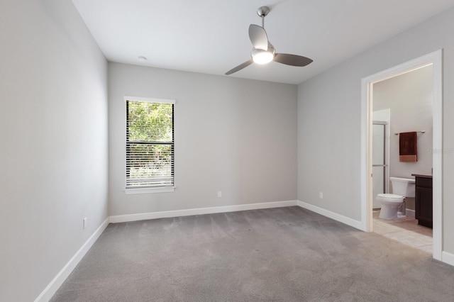 8191 Gabanna Dr, Sarasota, FL 34231 - unfurnished room with carpet flooring, a ceiling fan, and baseboards