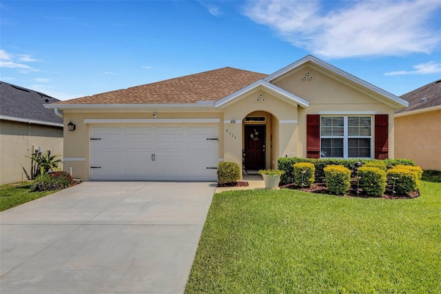 5111 11th St E, Bradenton, FL 34203 - view of front of property featuring stucco siding, a front lawn, concrete driveway, and a garage