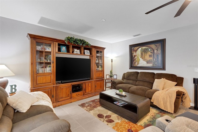 5111 11th St E, Bradenton, FL 34203 - living room featuring a ceiling fan and light tile patterned floors
