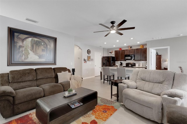 5111 11th St E, Bradenton, FL 34203 - living area with arched walkways, a ceiling fan, recessed lighting, and baseboards