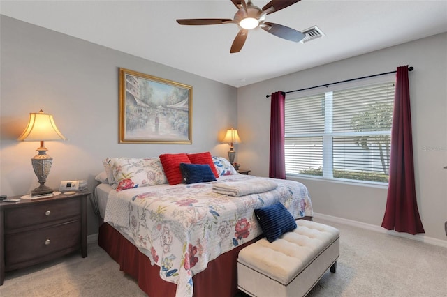 5111 11th St E, Bradenton, FL 34203 - bedroom with light carpet, baseboards, and ceiling fan