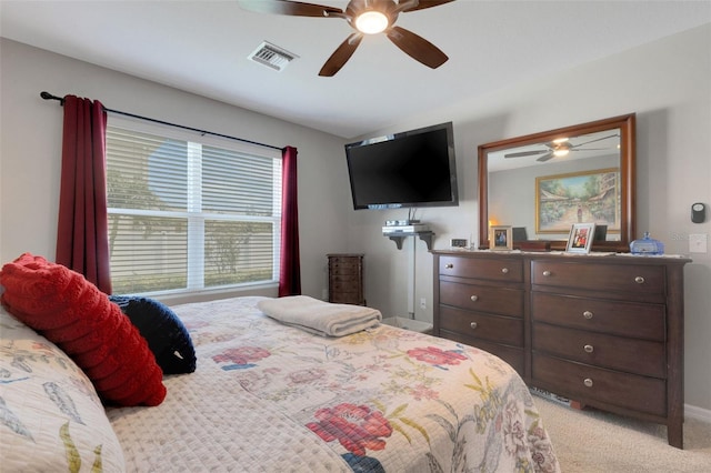 5111 11th St E, Bradenton, FL 34203 - bedroom featuring light carpet and a ceiling fan