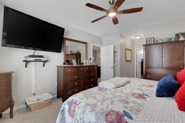 5111 11th St E, Bradenton, FL 34203 - bedroom featuring carpet flooring, baseboards, and ceiling fan