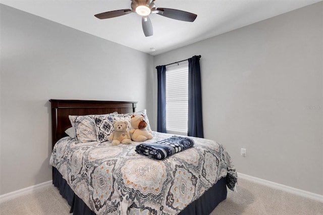 5111 11th St E, Bradenton, FL 34203 - bedroom featuring carpet, baseboards, and a ceiling fan
