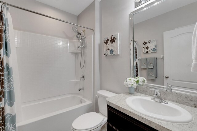 5111 11th St E, Bradenton, FL 34203 - bathroom featuring toilet, shower / bath combo, and vanity