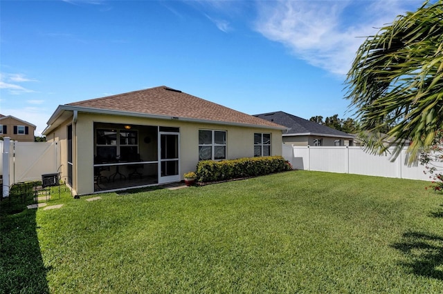 5111 11th St E, Bradenton, FL 34203 - back of property with stucco siding, a sunroom, and a shingled roof