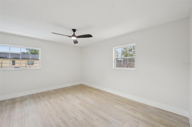 612 65th Ave W, Bradenton, FL 34207 - unfurnished room with light wood-type flooring, baseboards, and a ceiling fan