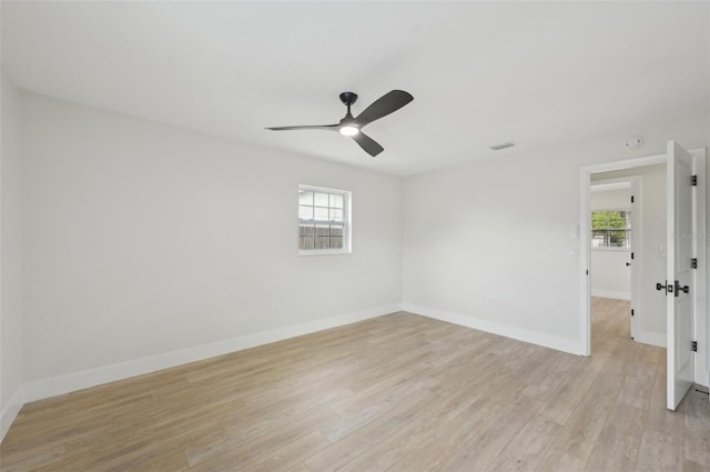 612 65th Ave W, Bradenton, FL 34207 - empty room with ceiling fan, light wood-style floors, and baseboards