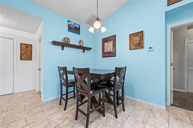 dining space with baseboards