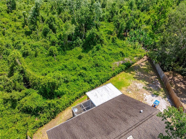 drone / aerial view of a heavily wooded area
