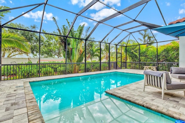5823 Title Row Dr, Bradenton, FL 34210 - view of swimming pool with a patio and a lanai