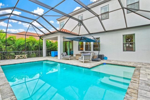 5823 Title Row Dr, Bradenton, FL 34210 - outdoor pool with a patio and glass enclosure