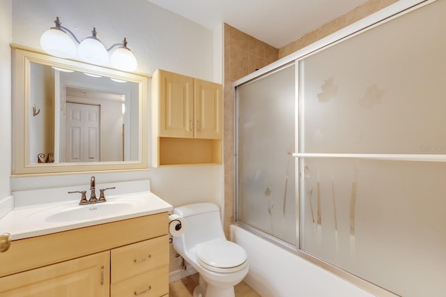 full bath featuring toilet, vanity, and enclosed tub / shower combo