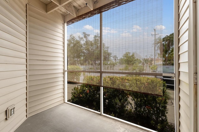 unfurnished sunroom with plenty of natural light