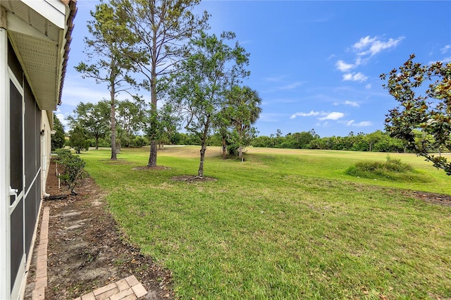 7637 Sweetbay Cir, Bradenton, FL 34203 - view of grassy yard with view of scattered trees