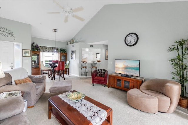7637 Sweetbay Cir, Bradenton, FL 34203 - living area featuring high vaulted ceiling, ceiling fan, light carpet, and baseboards
