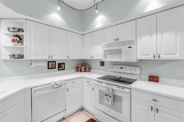 7637 Sweetbay Cir, Bradenton, FL 34203 - kitchen featuring white appliances, white cabinetry, and light countertops