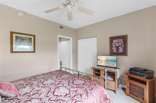 7637 Sweetbay Cir, Bradenton, FL 34203 - bedroom with carpet flooring, ceiling fan, and multiple closets