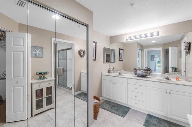 7637 Sweetbay Cir, Bradenton, FL 34203 - bathroom featuring a stall shower and double vanity