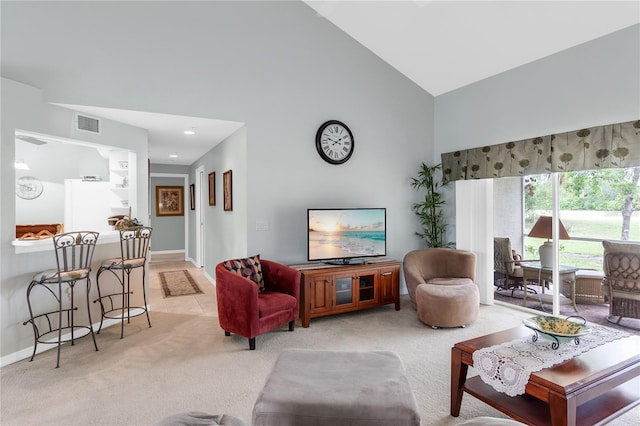 7637 Sweetbay Cir, Bradenton, FL 34203 - living area featuring high vaulted ceiling, light colored carpet, and baseboards