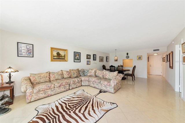 101 S Gulfstream Ave Unit 16C, Sarasota, FL 34236 - living area featuring light tile patterned floors and baseboards