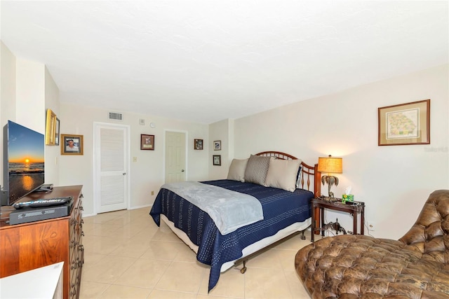 101 S Gulfstream Ave Unit 16C, Sarasota, FL 34236 - bedroom featuring light tile patterned flooring