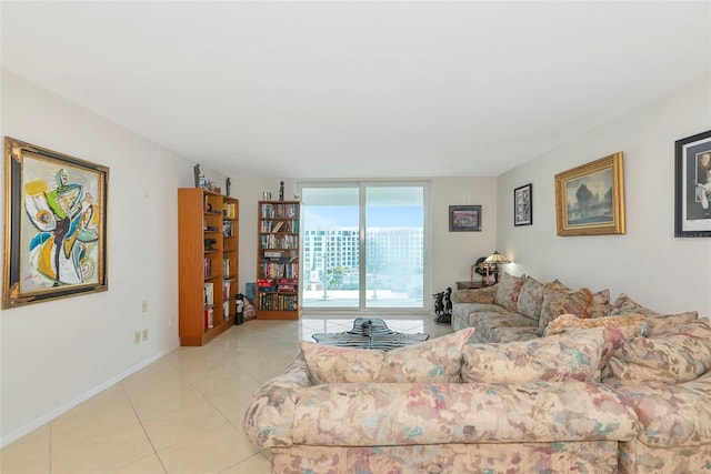101 S Gulfstream Ave Unit 16C, Sarasota, FL 34236 - living area featuring tile patterned flooring and baseboards