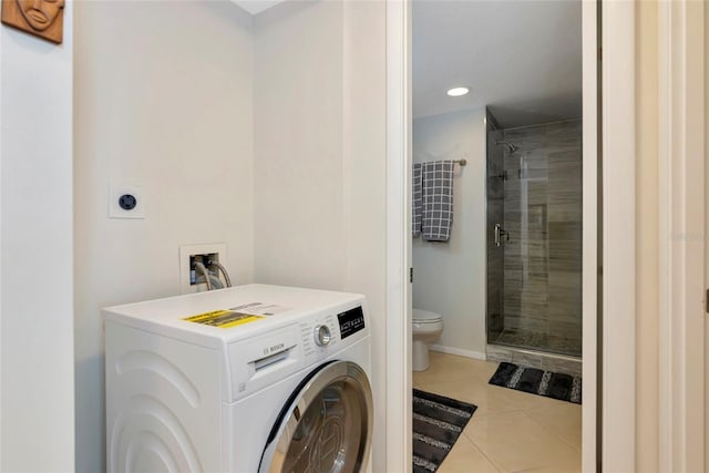 101 S Gulfstream Ave Unit 16C, Sarasota, FL 34236 - washroom with washer / clothes dryer, tile patterned flooring, recessed lighting, and baseboards