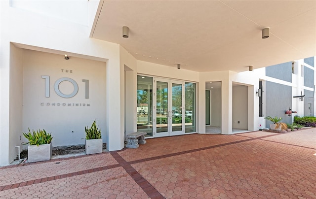 101 S Gulfstream Ave Unit 16C, Sarasota, FL 34236 - entrance to property featuring french doors and stucco siding
