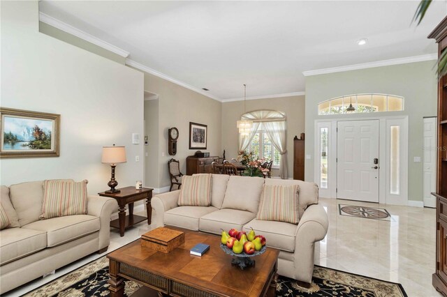 2067 Tocobaga Ln, Nokomis, FL 34275 - living room with ornamental molding, baseboards, and recessed lighting