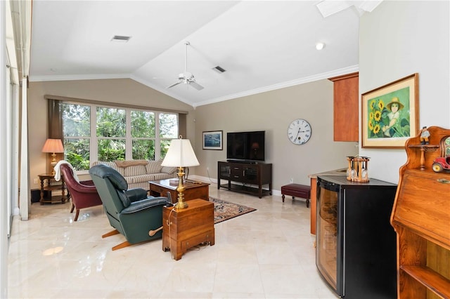 2067 Tocobaga Ln, Nokomis, FL 34275 - living room with a ceiling fan, vaulted ceiling, ornamental molding, and baseboards
