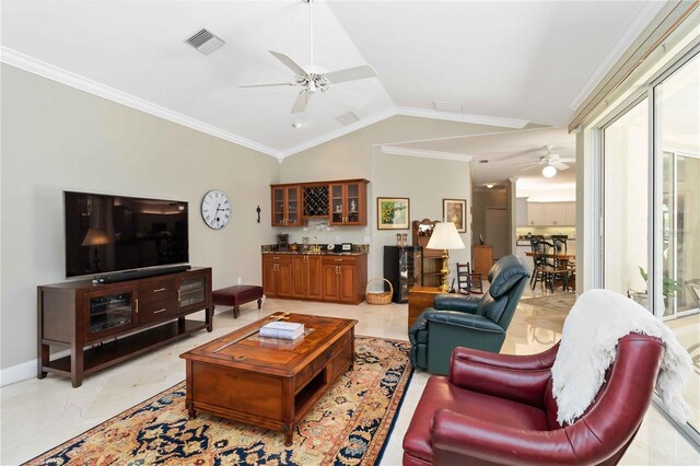 2067 Tocobaga Ln, Nokomis, FL 34275 - living area with a ceiling fan, lofted ceiling, bar area, ornamental molding, and baseboards