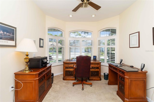 2067 Tocobaga Ln, Nokomis, FL 34275 - office area with healthy amount of natural light, light colored carpet, ceiling fan, and baseboards