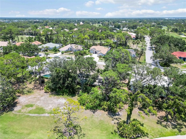 2067 Tocobaga Ln, Nokomis, FL 34275 - aerial perspective of suburban area featuring a tree filled landscape