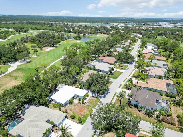 2067 Tocobaga Ln, Nokomis, FL 34275 - aerial perspective of suburban area featuring a golf course and a large body of water